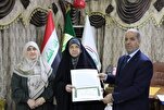 حافظة عراقية للقرآن تحصل على شهادة إجازة قراءة وإقراء القرآن + صور