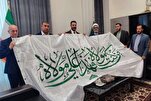 وفد العتبة العلويّة يسلّم راية الغدير الأغرّ إلى العتبة الرضوية + صور
