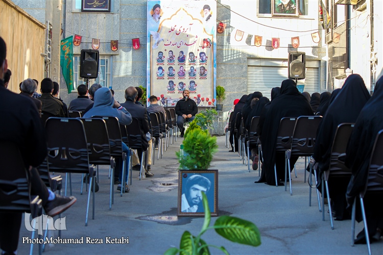 عکس | برگزاری مراسم آبروی محله در کوچه‌ای با 8 شهید