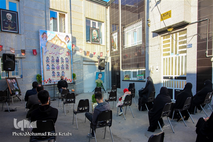 عکس | برگزاری مراسم آبروی محله در کوچه‌ای با 8 شهید