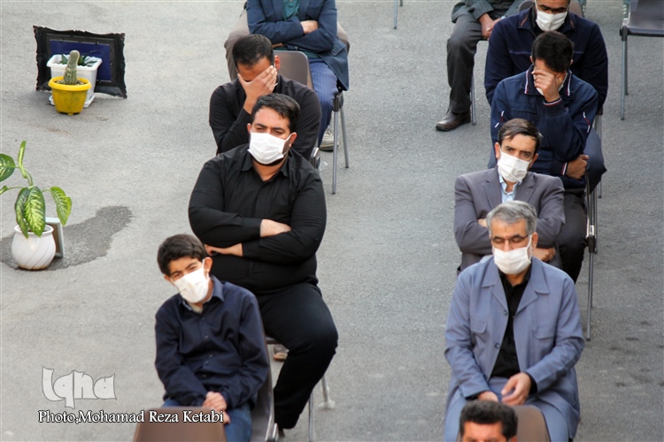 عکس | برگزاری مراسم آبروی محله در کوچه‌ای با 8 شهید