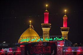 مراسم تعویض پرچم گنبد حرم حضرت اباالفضل العباس(ع)