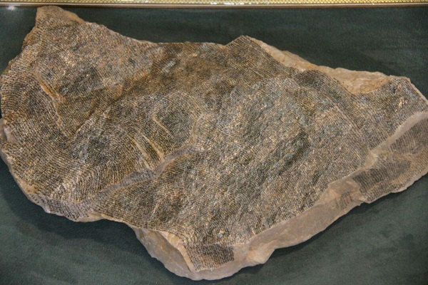 کتابت قرآن روی سنگ