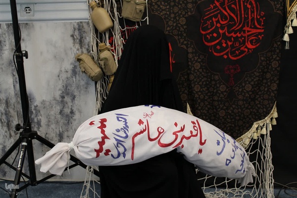 مراسم عزاداری و ایستگاه صلواتی خادمین الشهداءملایر‎